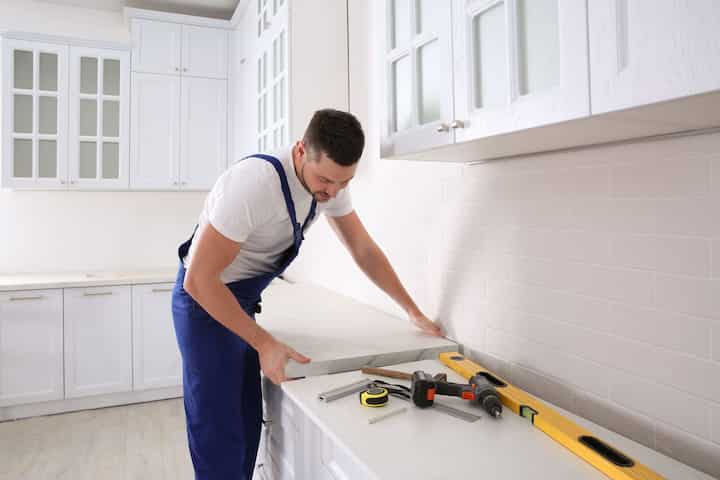 A kitchen countertop made of a durable and stain-resistant material, designed for easy maintenance in Winchester